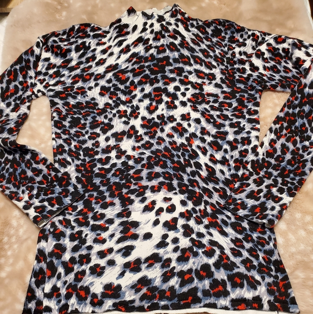 Sweater time. G orgeois leopard print rare find as to colors